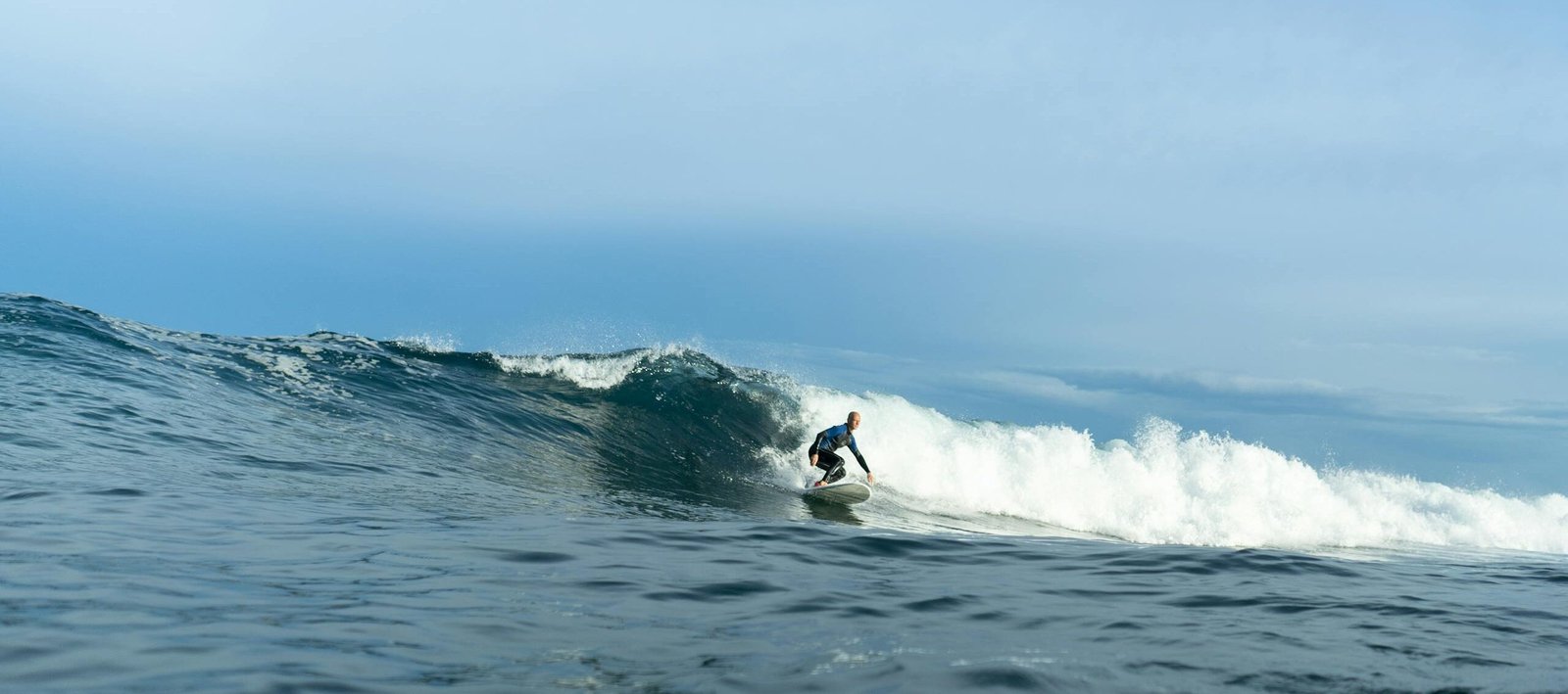 A Person Surfing on the Sea